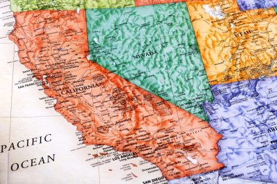 Close up image of the state of California on globe with terrain