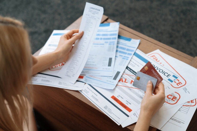 Stress young woman sit at at table, pay credit card debt. Blithe