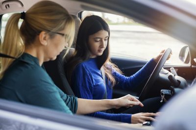 Teenage girl learning to drive